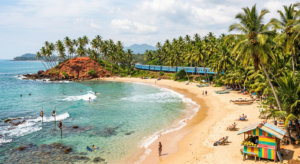 bellesplagesSriLanka Sri Lanka Vue panoramique daposune plage tropicale au Sri Lanka avec du sable doré des cocotiers sur une colline rouge des pêcheurs sur échasses et laposocéan Indien turquoises